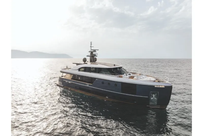 Slide: The Image of 2023 Azimut Magellano 30M luxury yacht cruising on open water. - 20