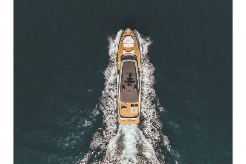Slide: The Image of Aerial view of 2023 Azimut Magellano 30M yacht cruising on open water. - 21