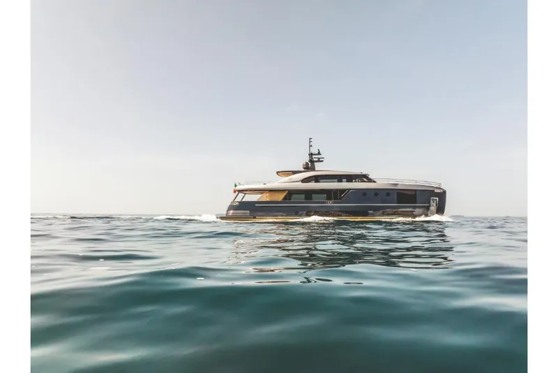 Slide: The Image of 2023 Azimut Magellano 30M yacht cruising on open water. - 22