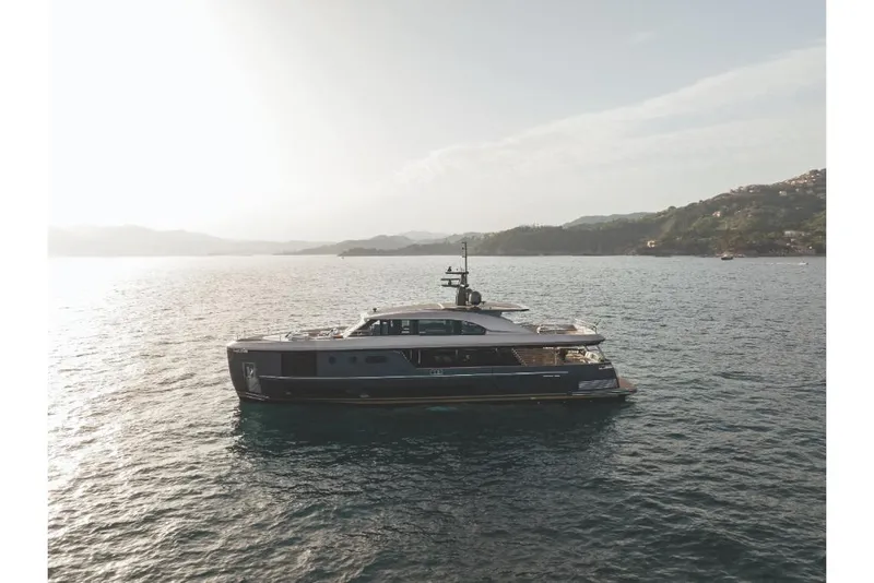 Slide: The Image of 2023 Azimut Magellano 30M yacht cruising on a serene sea. - 24