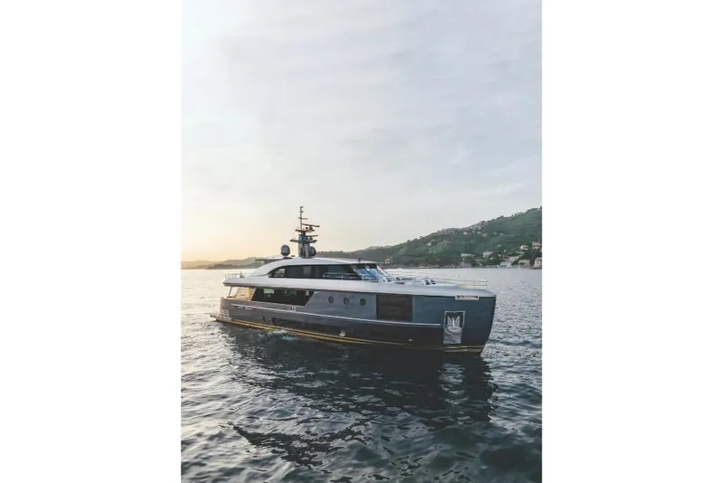 Slide: The Image of 2023 Azimut Magellano 30M yacht on calm waters at sunset. - 28