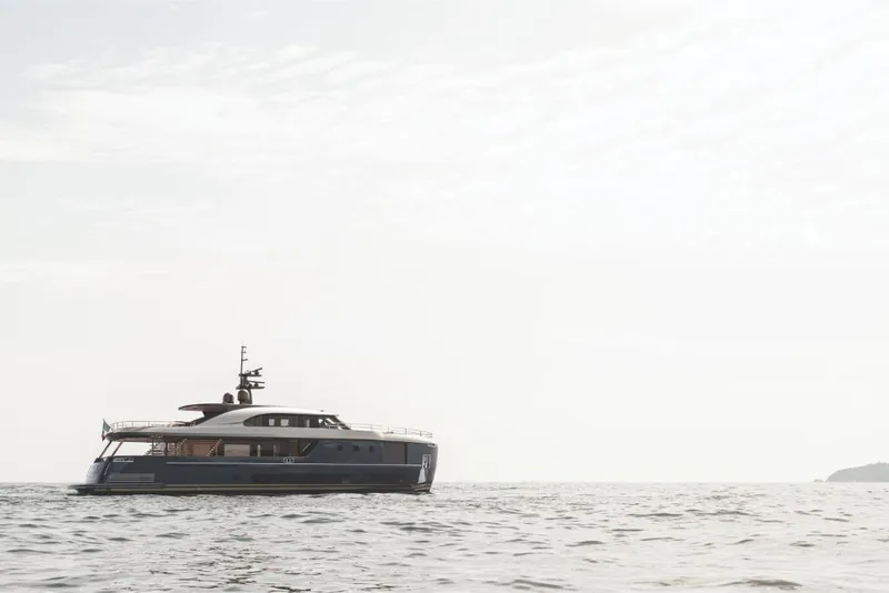 Slide: The Image of 2023 Azimut Magellano 30M yacht cruising on open water. - 7