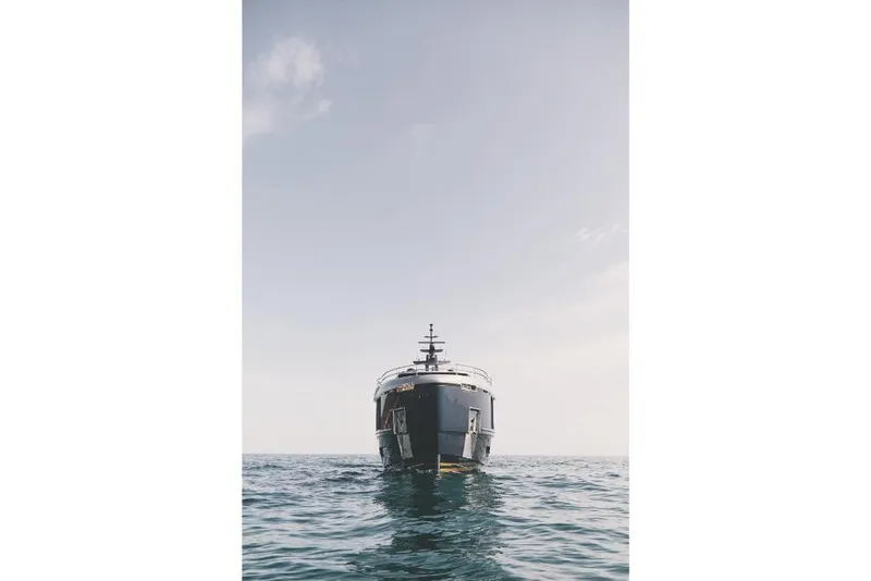 Slide: The Image of Front view of 2023 Azimut Magellano 30M yacht on open water. - 9