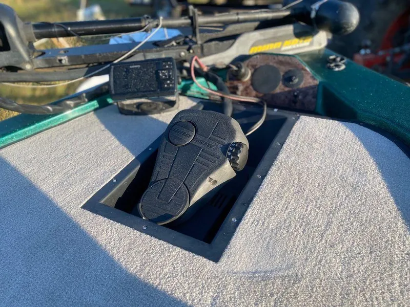 Slide: The Image of Foot pedal control on a 2002 Bumble Bee 18 boat deck. - 14