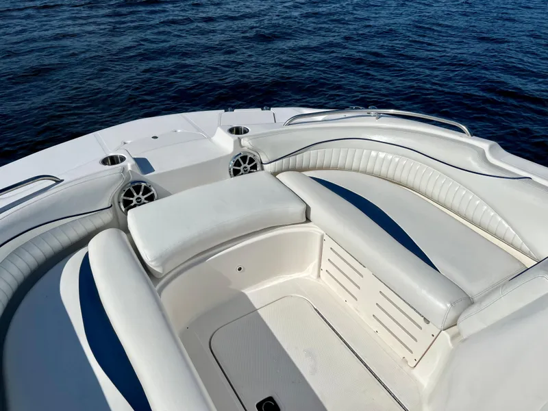 Slide: The Image of 2006 Hurricane 194 boat interior with white seating and ocean view. - 18