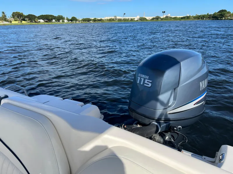 Slide: The Image of Boat with Yamaha 115 outboard motor on a lake, Hurricane 194 model, 2006. - 21