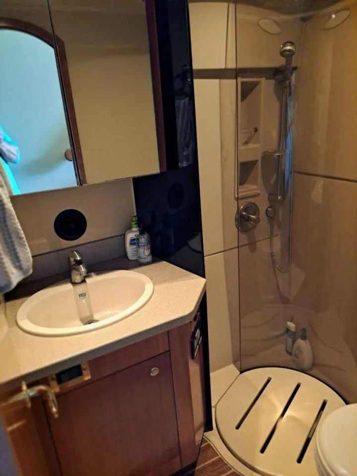 Slide: The Image of Bathroom in 2005 Rampage 45 Convertible boat. - 21