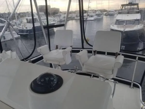 Slide: The Image of Interior view of 2005 Rampage 45 Convertible yacht with harbor view. - 8