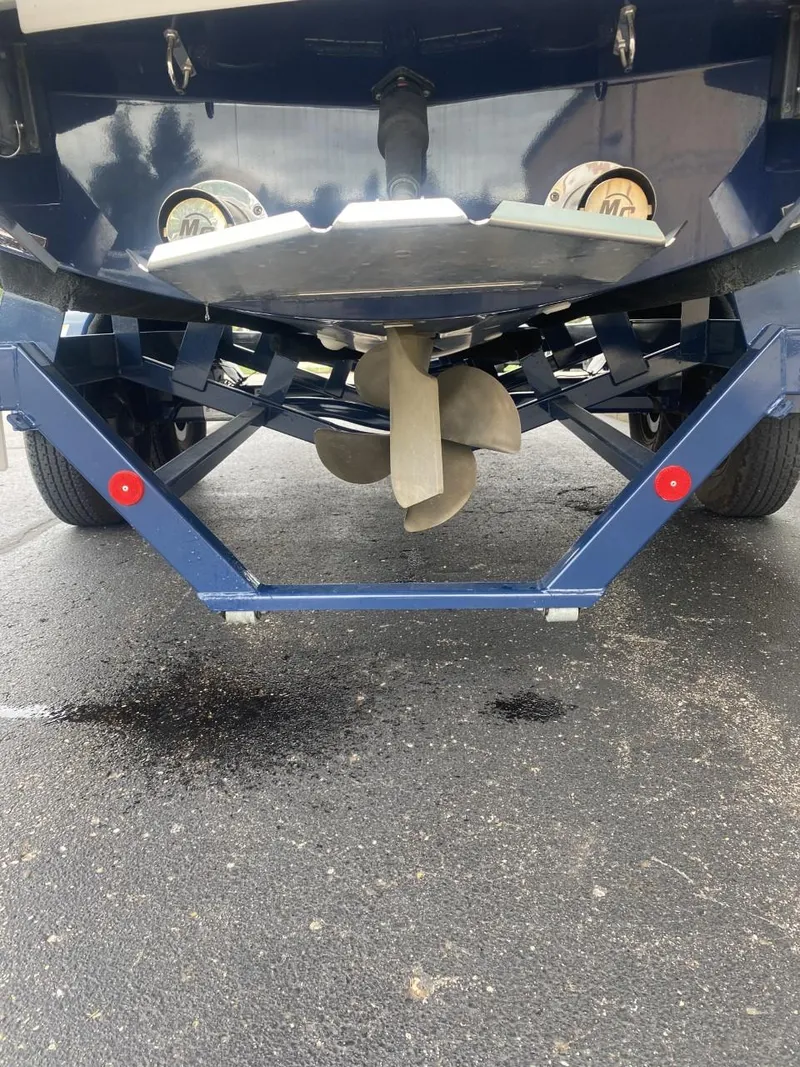 Slide: The Image of 2016 MasterCraft X23 boat propeller and trailer view. - 13