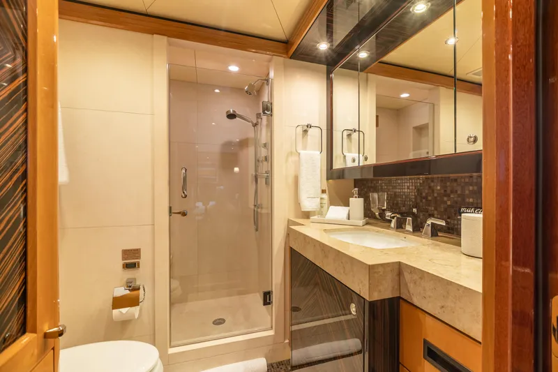 Slide: The Image of Luxurious bathroom on a 2011 Trinity Yachts CUSTOM yacht with modern fixtures and glass shower. - 23