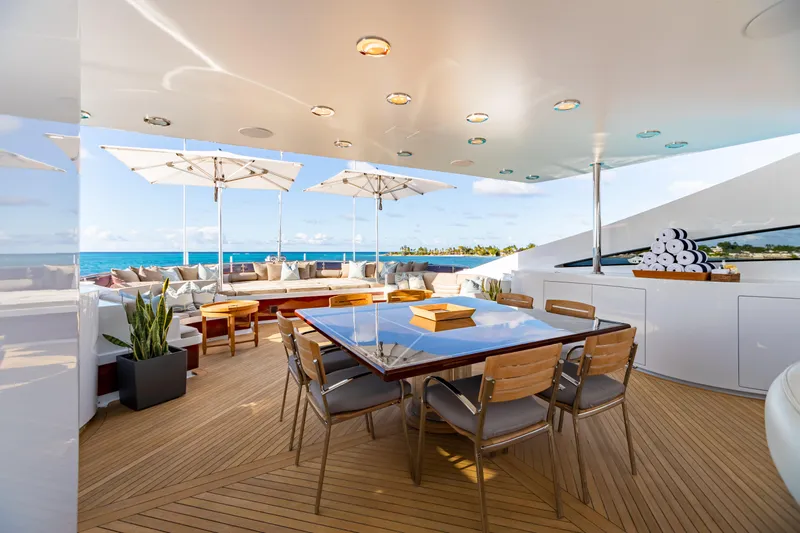 Slide: The Image of Luxurious deck of 2011 Trinity Yachts CUSTOM with dining area and ocean view. - 38