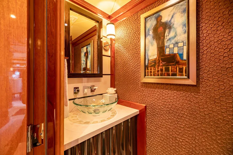 Slide: The Image of Luxurious bathroom on 2011 Trinity Yachts CUSTOM with glass sink and modern artwork. - 4