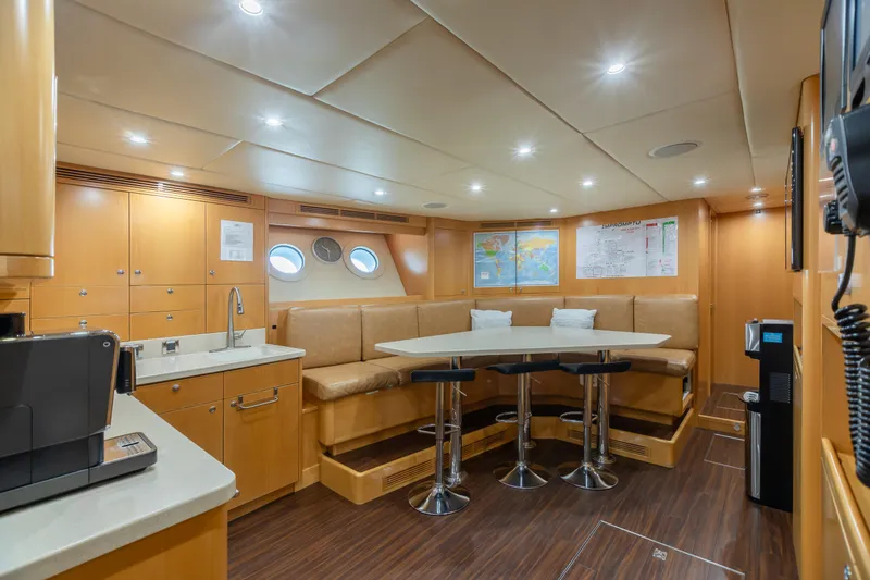 Slide: The Image of Luxurious interior of 2011 Trinity Yachts CUSTOM model with modern seating and dining area. - 46