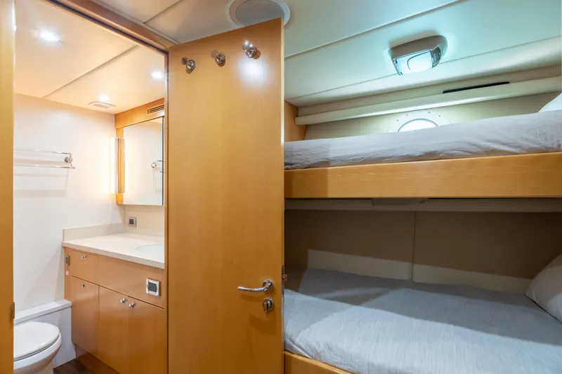 Slide: The Image of 2011 Trinity Yachts CUSTOM interior with bunk beds and bathroom - 47