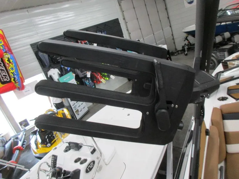 Slide: The Image of 2023 Axis A225 boat with wakeboard rack in showroom. - 12