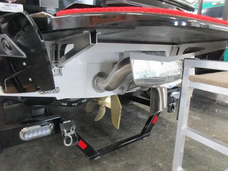 Slide: The Image of 2023 Axis A225 boat stern with propeller and exhaust system. - 13