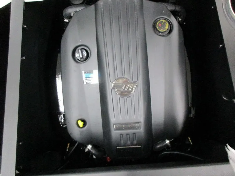 Slide: The Image of 2023 Axis A225 boat engine compartment with a modern, powerful engine. - 14
