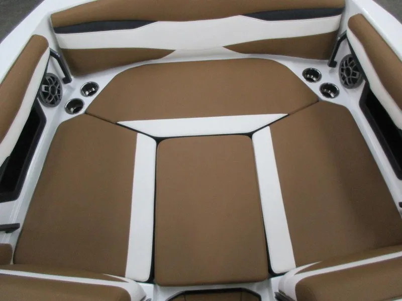 Slide: The Image of 2023 Axis A225 boat interior with brown and white cushioned seating. - 3