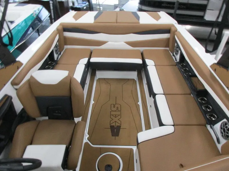 Slide: The Image of 2023 Axis A225 boat interior with tan and white seating. - 4