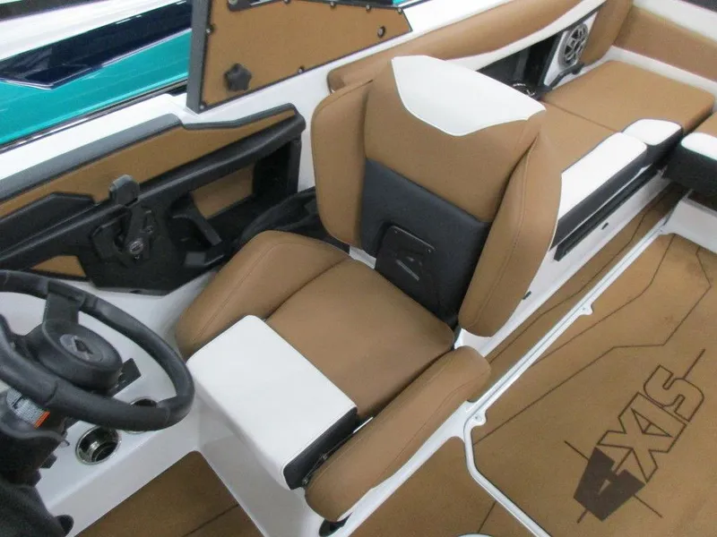 Slide: The Image of 2023 Axis A225 boat interior with tan and white seating. - 5