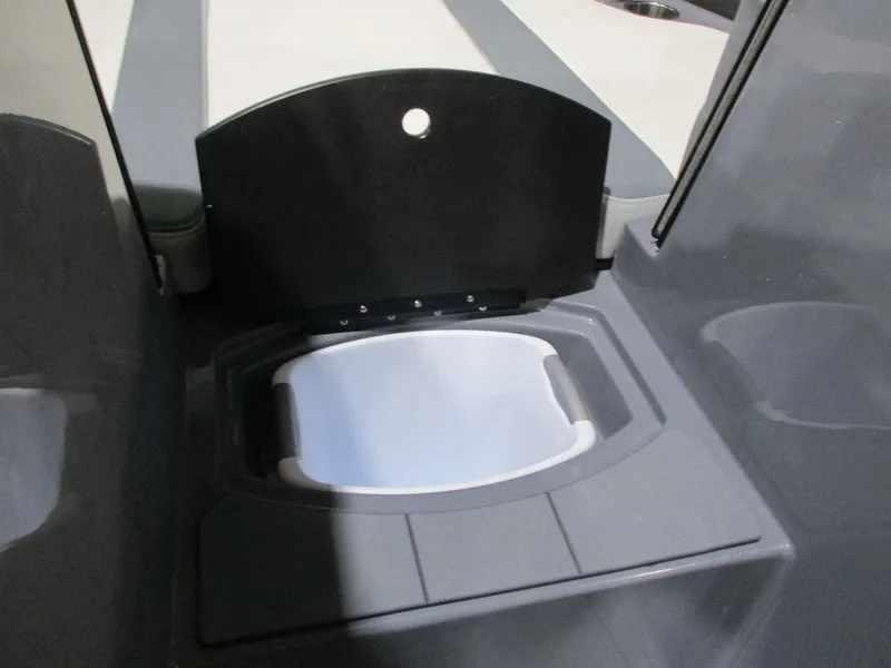 Slide: The Image of 2023 Axis T220 boat storage compartment with lid. - 18