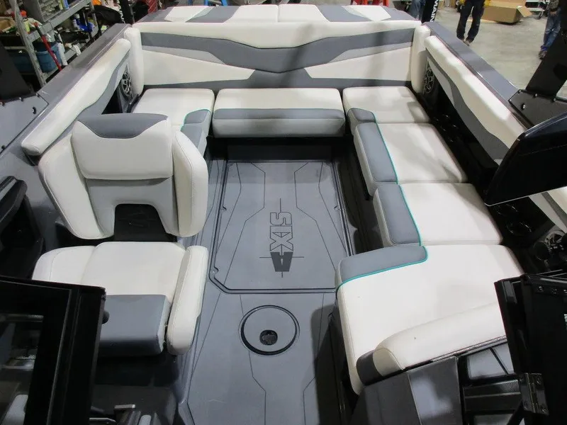 Slide: The Image of 2023 Axis T220 boat interior with spacious seating and modern design. - 20