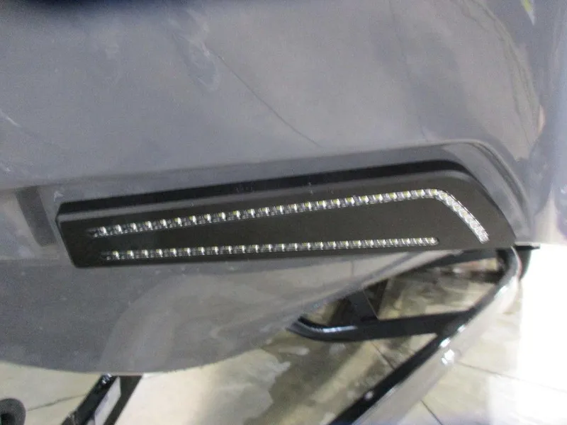 Slide: The Image of Close-up of 2023 Axis T220 boat's sleek LED light detail. - 5