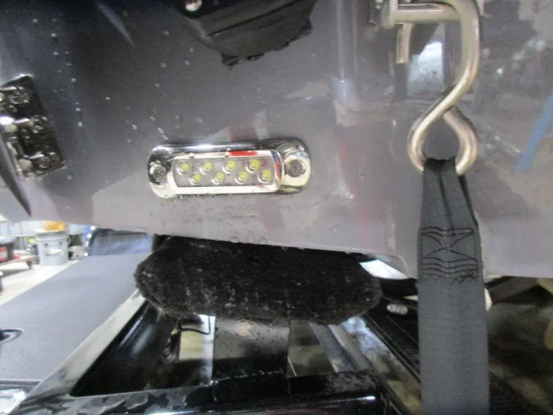 Slide: The Image of Close-up of 2023 Axis T220 boat trailer hitch and LED light. - 7
