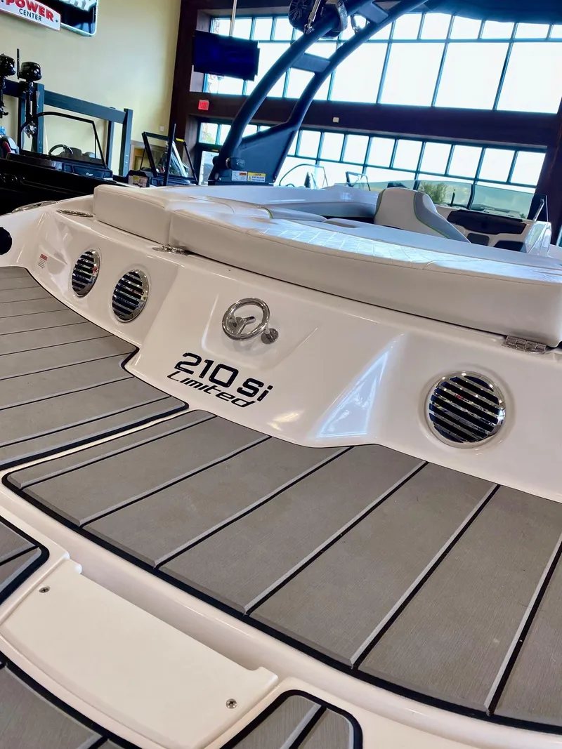 Slide: The Image of 2023 Tahoe 210 Si Limited boat interior with seating and deck. - 4