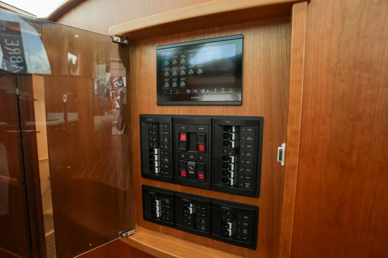 Slide: The Image of Electrical control panel on 2025 Sabre 45 Salon Express yacht. - 32