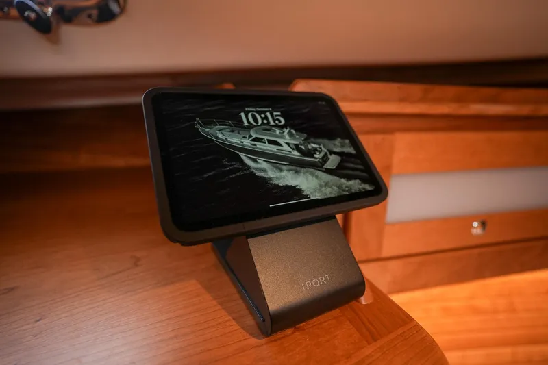 Slide: The Image of Tablet displaying Sabre 45 Salon Express 2025, on a wooden surface. - 35
