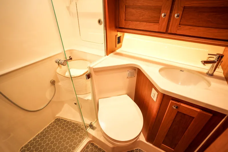 Slide: The Image of Luxurious bathroom in 2025 Sabre 45 Salon Express yacht with modern fixtures. - 36