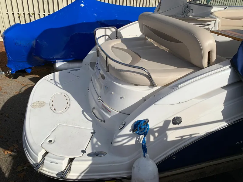 Slide: The Image of 2006 Chaparral 276 Signature boat stern with swim platform and seating. - 3