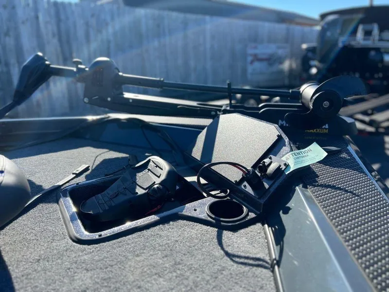 Slide: The Image of 2023 Ranger RT198P boat dashboard with fishing equipment and controls. - 1