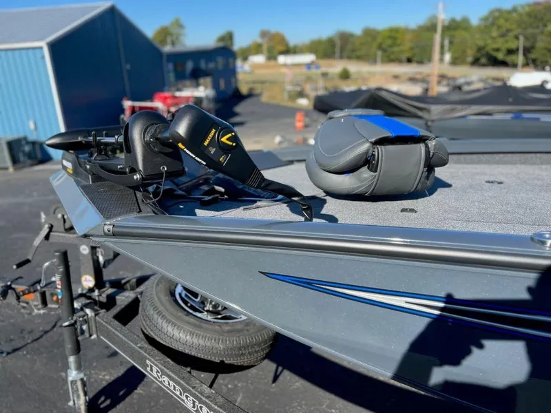 Slide: The Image of 2023 Ranger RT198P boat on trailer with equipment, outdoors. - 11