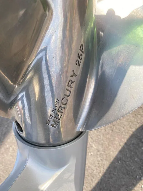 Slide: The Image of Close-up of a Mercury 25P propeller on a 2014 Ranger Z520C boat. - 14