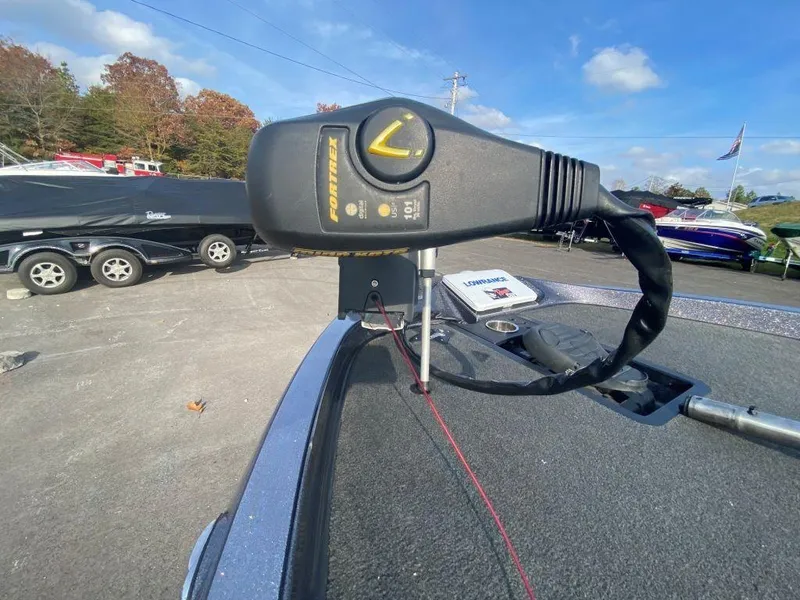 Slide: The Image of 2014 Ranger Z520C boat with trolling motor in parking lot. - 4