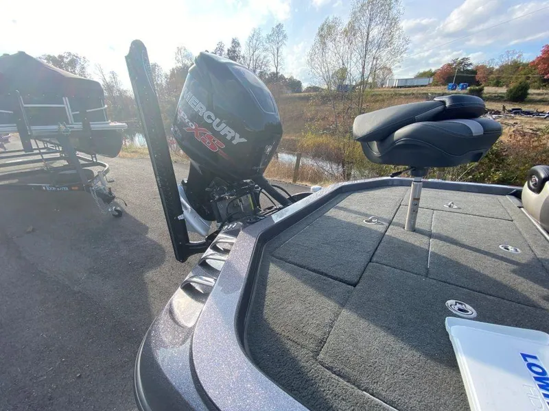 Slide: The Image of 2014 Ranger Z520C boat with Mercury engine on a sunny day. - 8