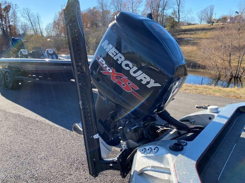 Slide: The Image of 2014 Ranger Z520C boat with Mercury 250 XS engine by a lake. - 16