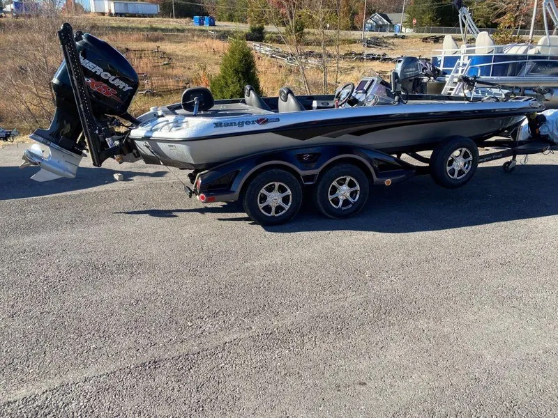 Slide: The Image of 2014 Ranger Z520C bass boat with Mercury engine on trailer. - 19