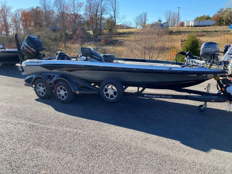 Slide: The Image of 2014 Ranger Z520C bass boat on trailer in outdoor setting. - 20