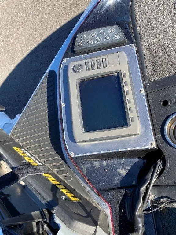 Slide: The Image of 2014 Ranger Z520C boat dashboard with electronic display and controls. - 6