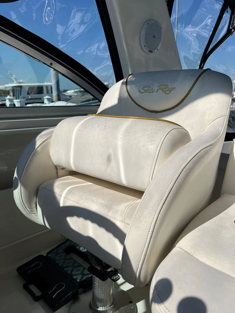 Slide: The Image of Luxurious Sea Ray 34 DA 2000 boat seat with elegant white upholstery. - 16