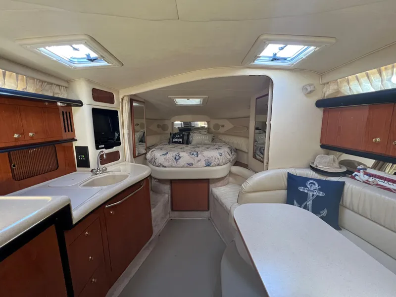 Slide: The Image of Interior of 2000 Sea Ray 34 DA yacht with cozy cabin and modern amenities. - 24