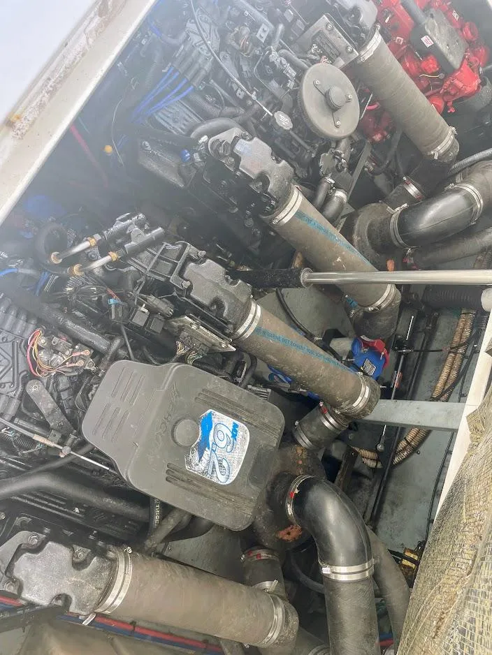 Slide: The Image of Engine compartment of a 2002 Sea Ray 340 Sundancer boat. - 24