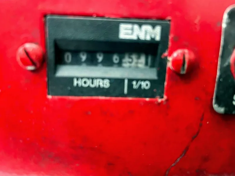 Slide: The Image of Hour meter on a 2002 Sea Ray 340 Sundancer boat showing 996.5 hours. - 25