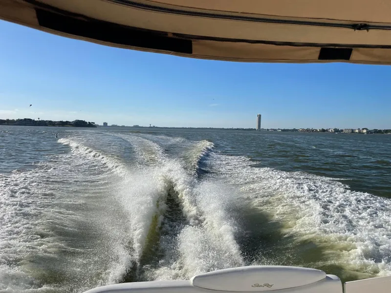 Slide: The Image of Sea Ray 340 Sundancer 2002 cruising, leaving a wake on a sunny day. - 39