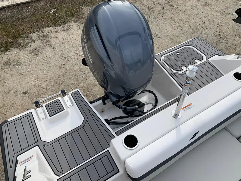 Slide: The Image of 2026 Starcraft SVX 190 boat with outboard motor, featuring sleek deck design and modern fittings. - 14