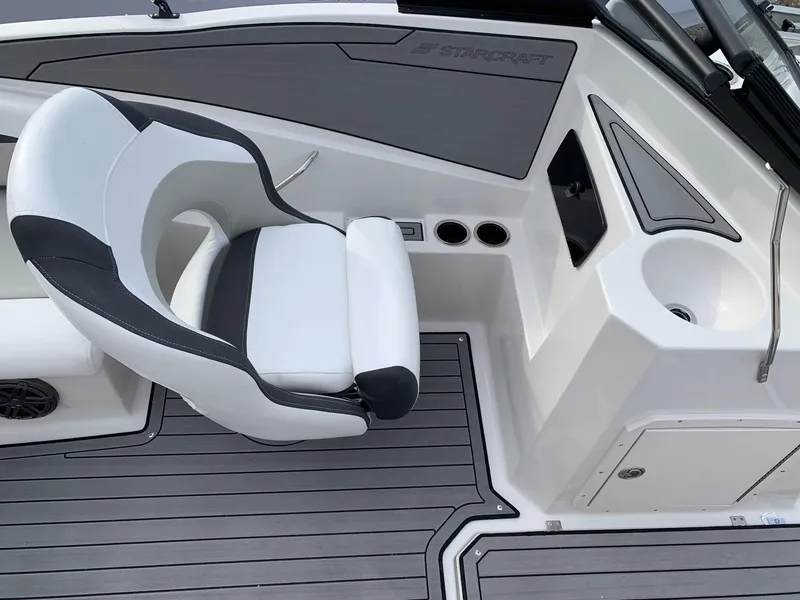 Slide: The Image of 2026 Starcraft SVX 190 boat interior with white seating and modern design. - 9