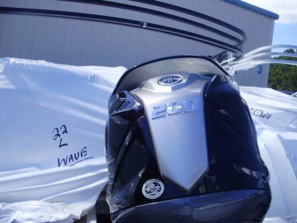 Slide: The Image of 2023 Bennington 22LFB boat with 200 HP engine, wrapped for delivery. - 4